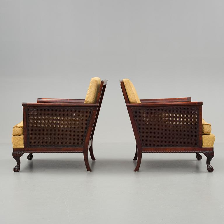 a pair of chippendale style armchairs from the 1930's/-40's.