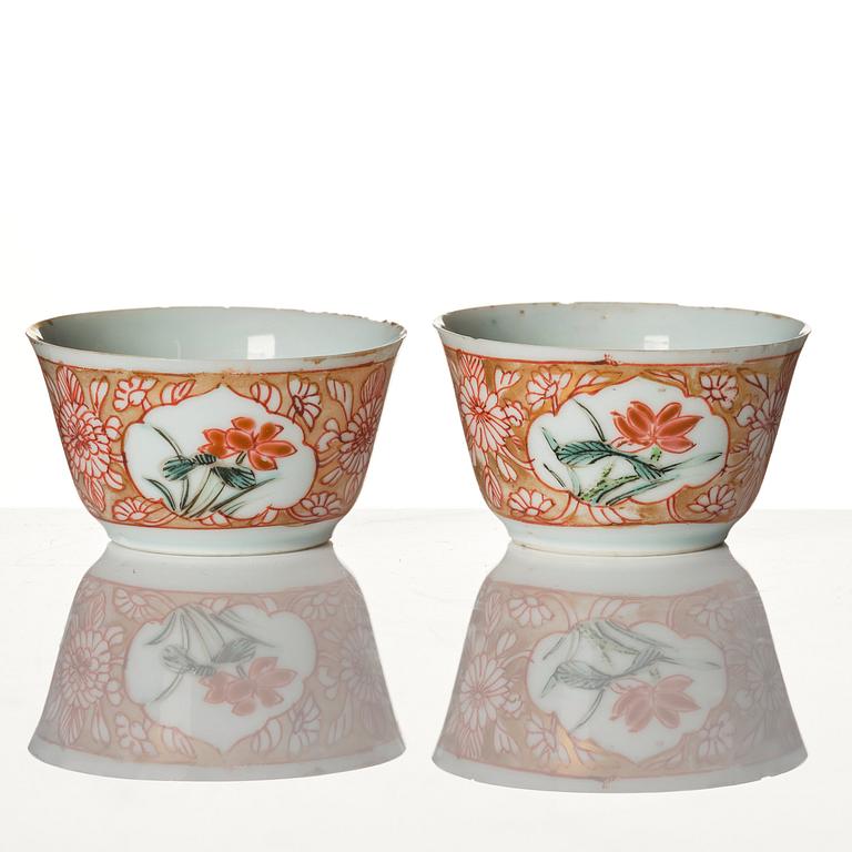 A pair of famille rose miniature cups with stands, Qing dynasty, 18th Century.