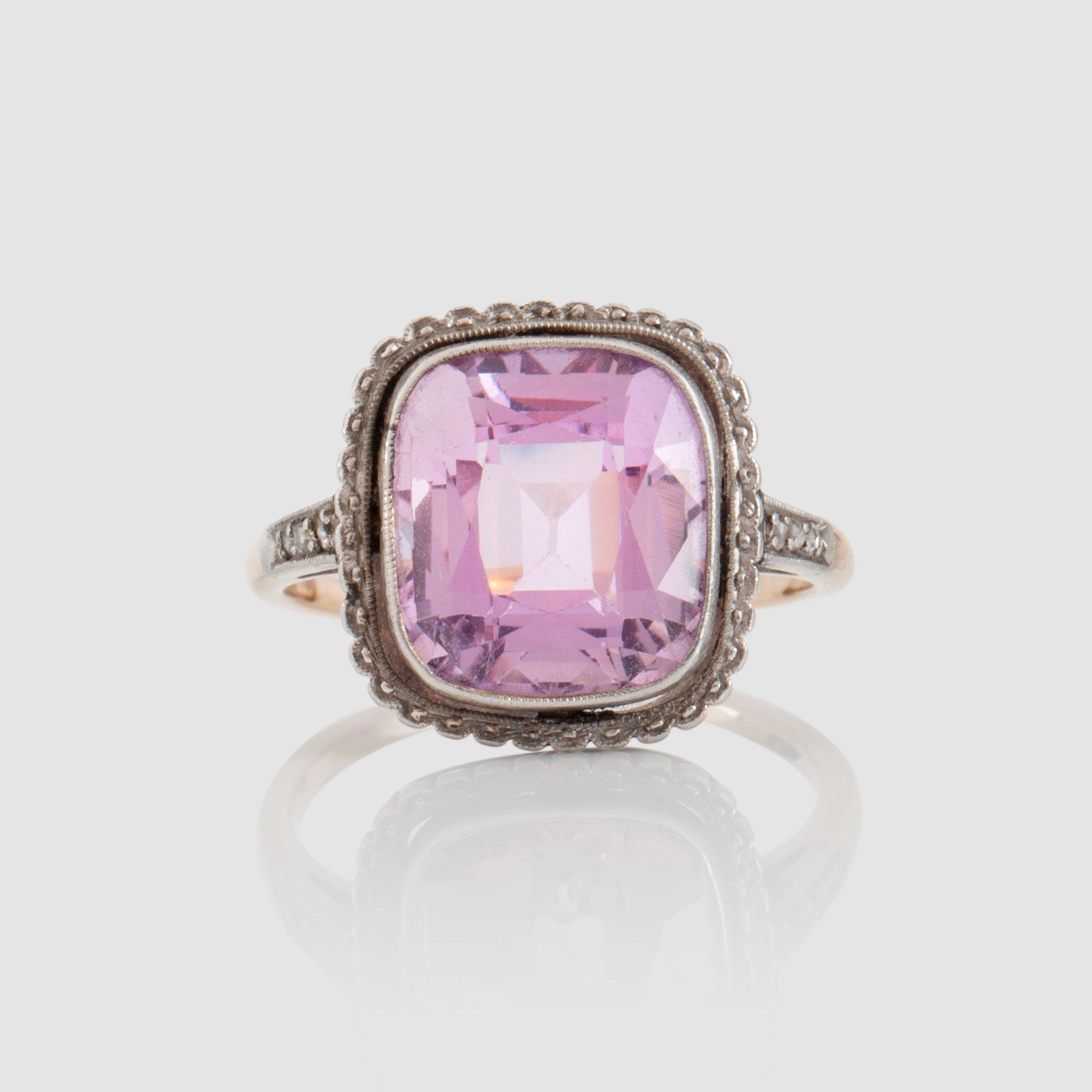 A circa 6.00 cts imperial topaz and rose-cut diamond ring.