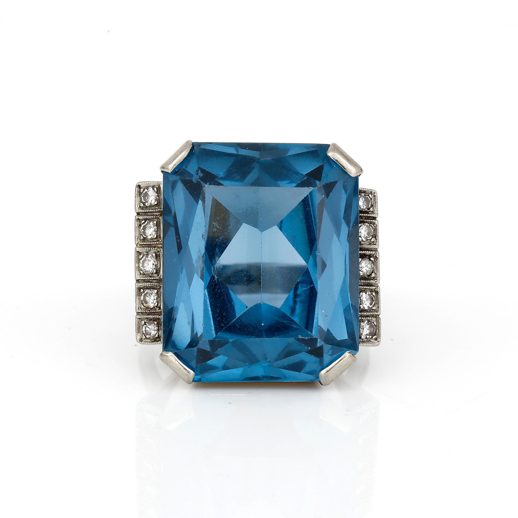 RING, med syntetisk blå spinell, ca 38 ct, och åttkantslipade diamanter, totalt ca 0,20 ct, MKS, Stockholm, 1962.