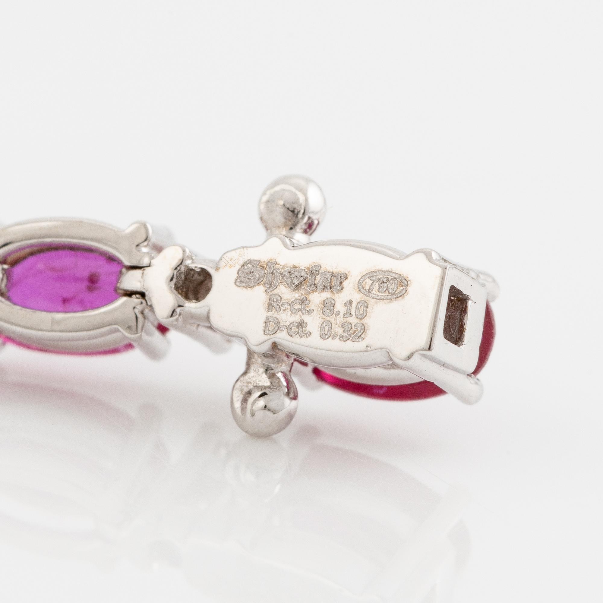 Bracelet 18K white gold with rubies and brilliant-cut diamonds.