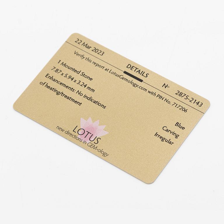 Pendant, 18K gold with carved sapphires, white sapphire, and a small rose-cut diamond.