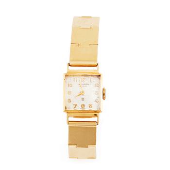 511. Wiwen Nilsson, an 18K gold bracelet executed in Lund 1955 with an Universal wrist watch.