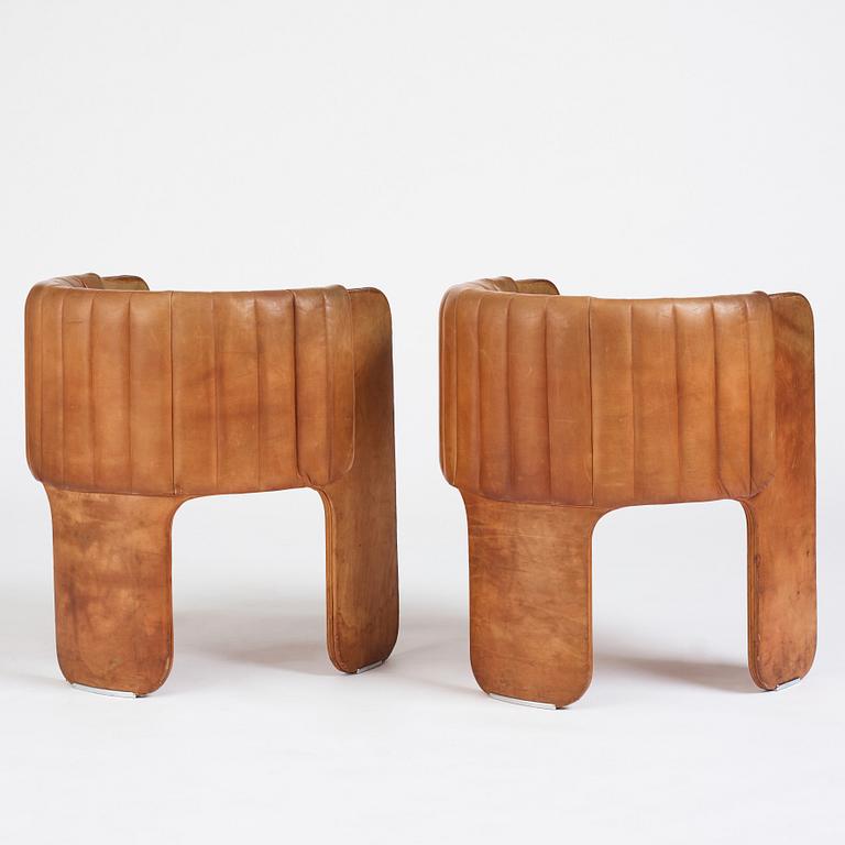 Luigi Massoni, a pair of easy chairs, Poltrona Frau, Italy 1970's.