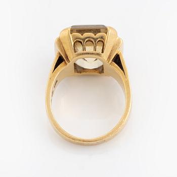 18K gold and emerald cut citrine ring.