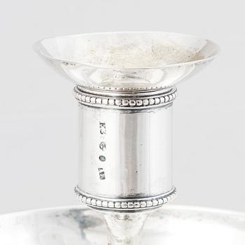 A pair of Swedish early 19th century silver chamber-candlesticks, mark of Adolf Zethelius, Stockholm 1816.