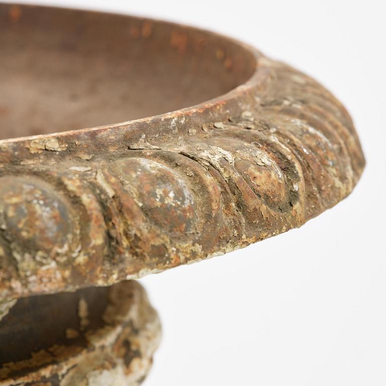A Swedish cast-iron garden urn, late 19th century.