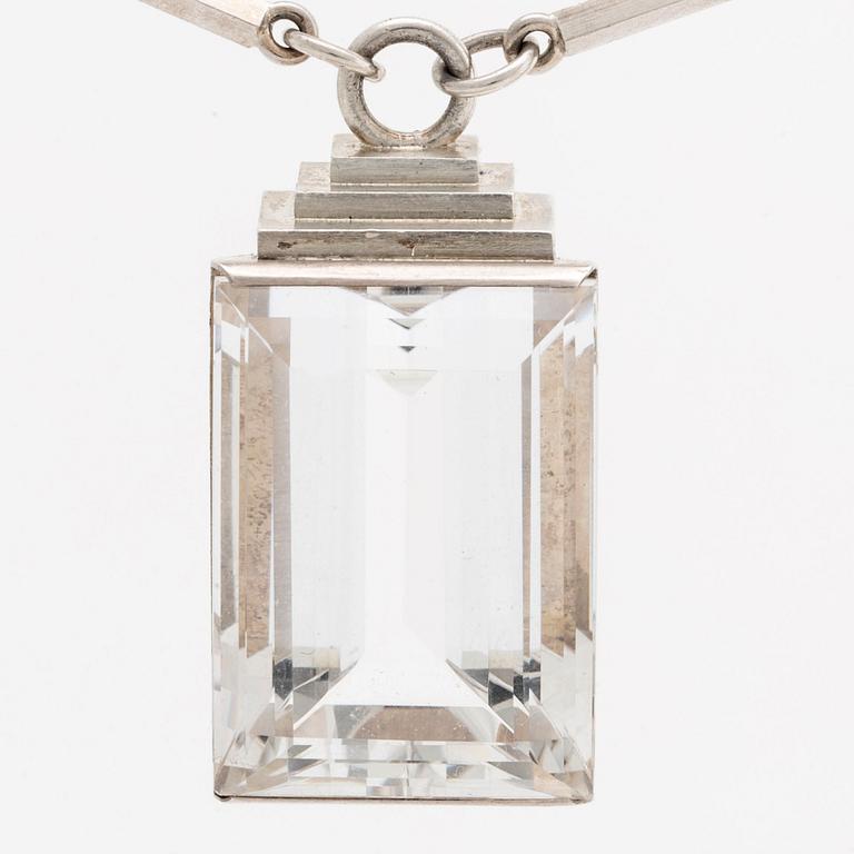 A Wiwen Nilsson sterling and rock crystal pendant and chain, stamped 'New York 39', Lund 1939.