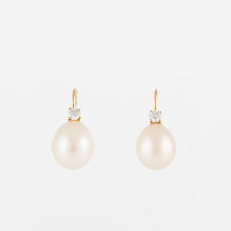 Earrings, a pair, gold with cultured pearls and brilliant-cut diamonds.