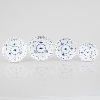 A group of four 'Blue Fluted' / 'Musselmalet rifflet' cups with saucers, Royal Copenhagen, 19th century and later.