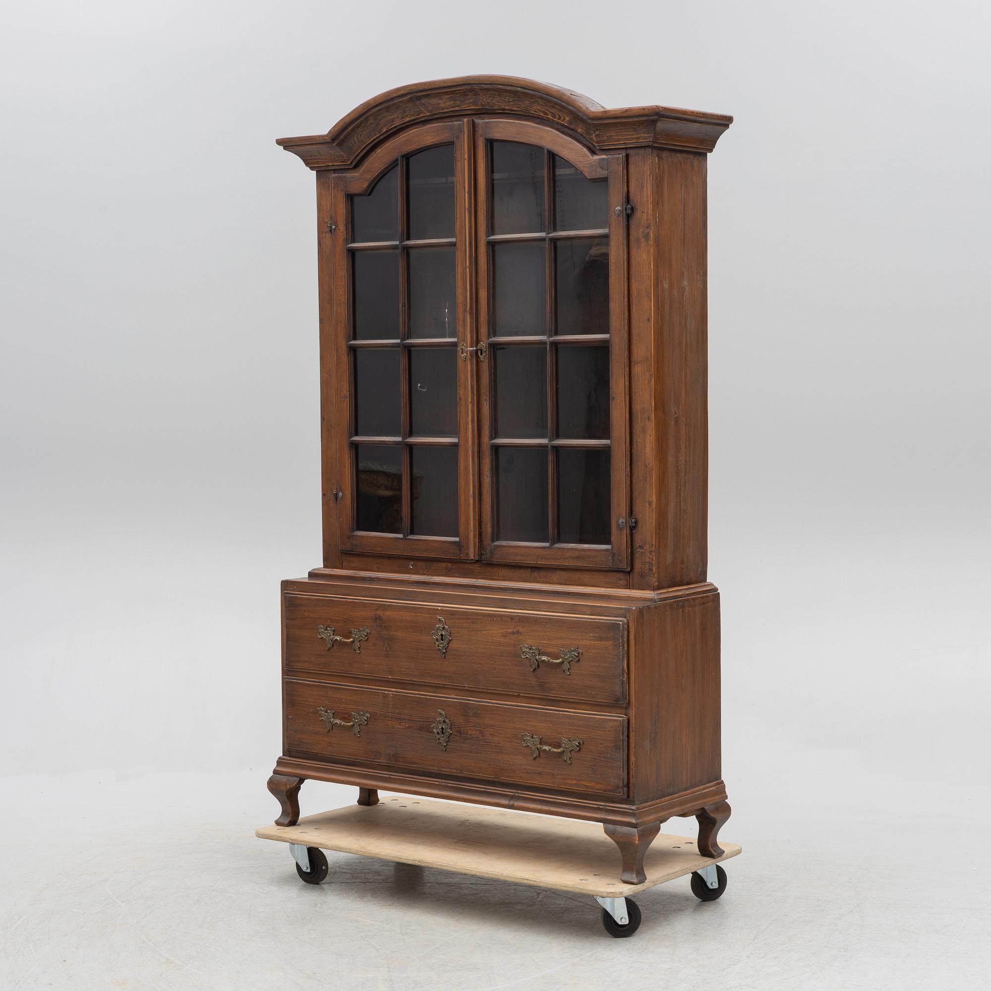 A display cabinet, 18th Century.