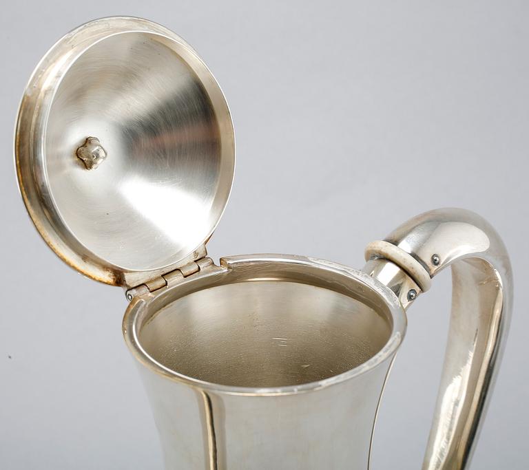 A silver coffee set of four pieces from the middle of the 20th century.