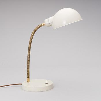 A mid-20th century AK 15 table lamp for Itsu Finland.