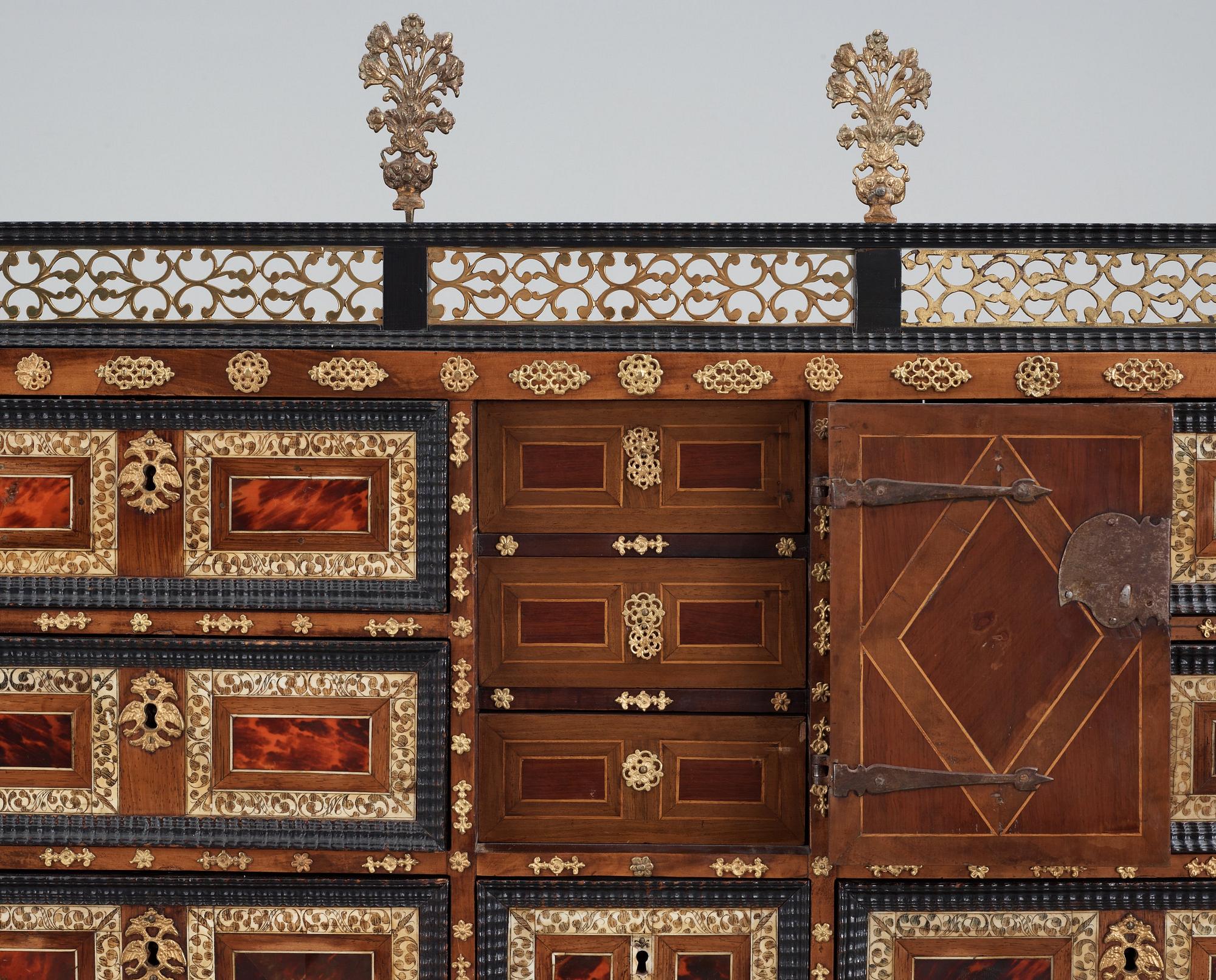 A Baroque 17/18th century cabinet, on later stand.