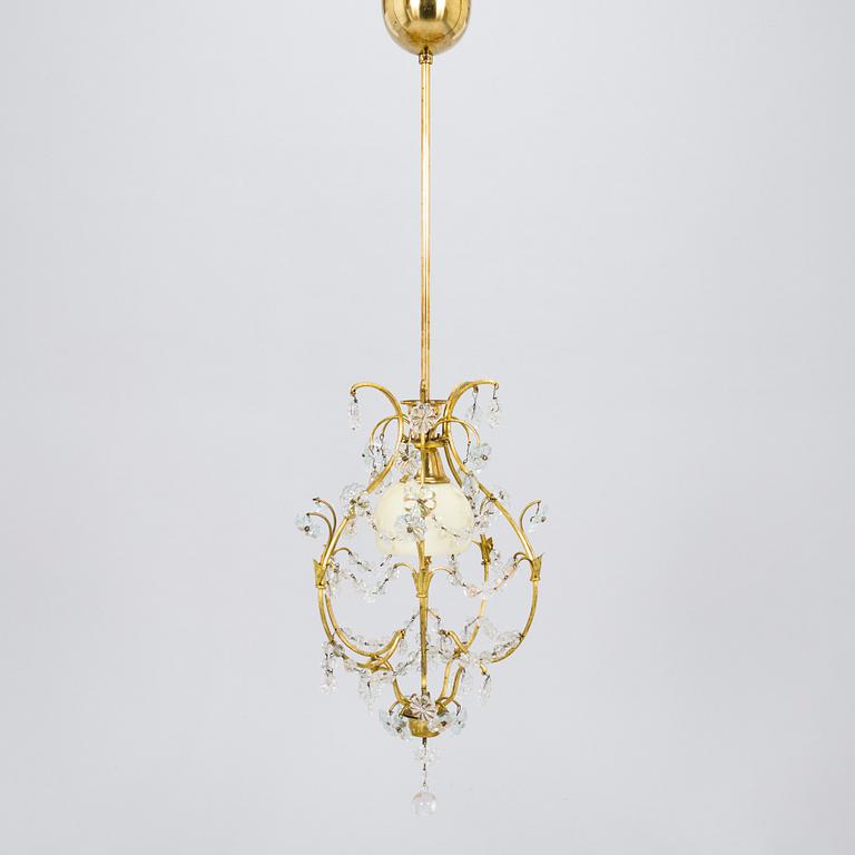 Lisa Johansson-Pape, a 1940s chandelier model 24 for Stockmann Orno.