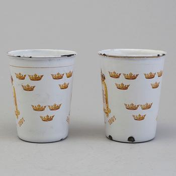 A pair memorial enamel cup in memory of Kin Oscar II's 25 years on the trone, 1872-1897, produced by Kockums.