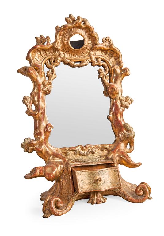 A TOILETTE MIRROR.