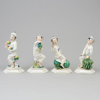 A group of four German figurines of Japanese women with fruit, Swarzburger Werstättet, Unterweissbach, Germany, 1930's.