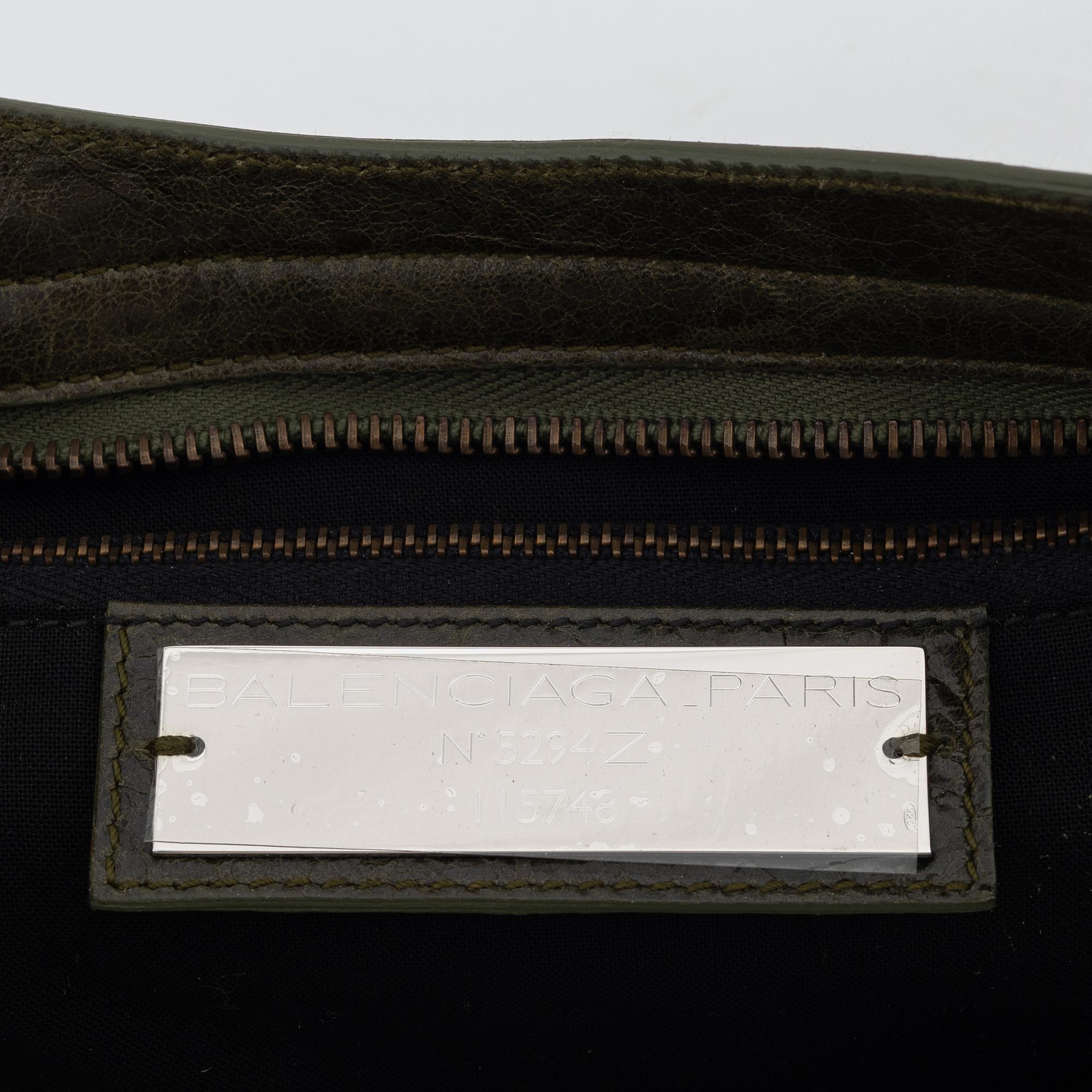 Balenciaga, a green leather bag.