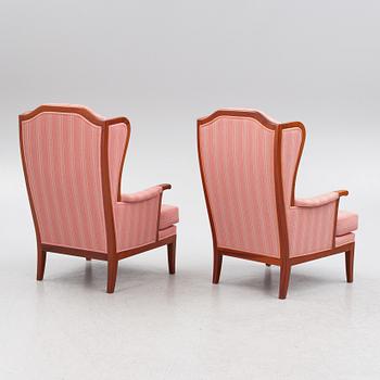 Carl Malmsten, a pair of 'Husfadern' armchairs, OH Sjögren 1988.