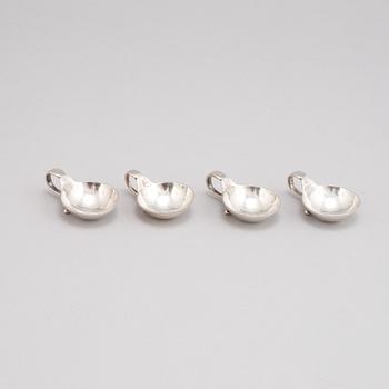 Four silver salt cellars from Georg Jensen.