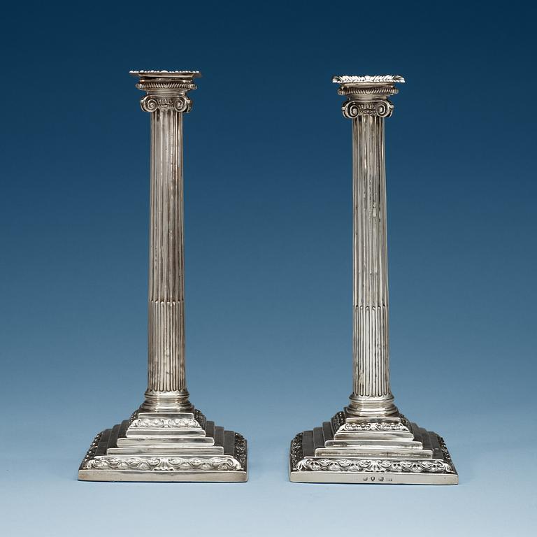 A pair of English silver candlesticks, possibly of Andrew Fogelberg, London 1766.