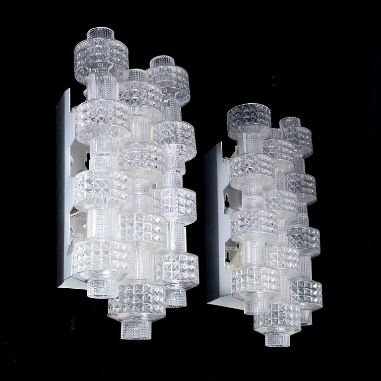 A pair of wall lamps by Gert Nyström for Fagerhult, second half of the 20th century.