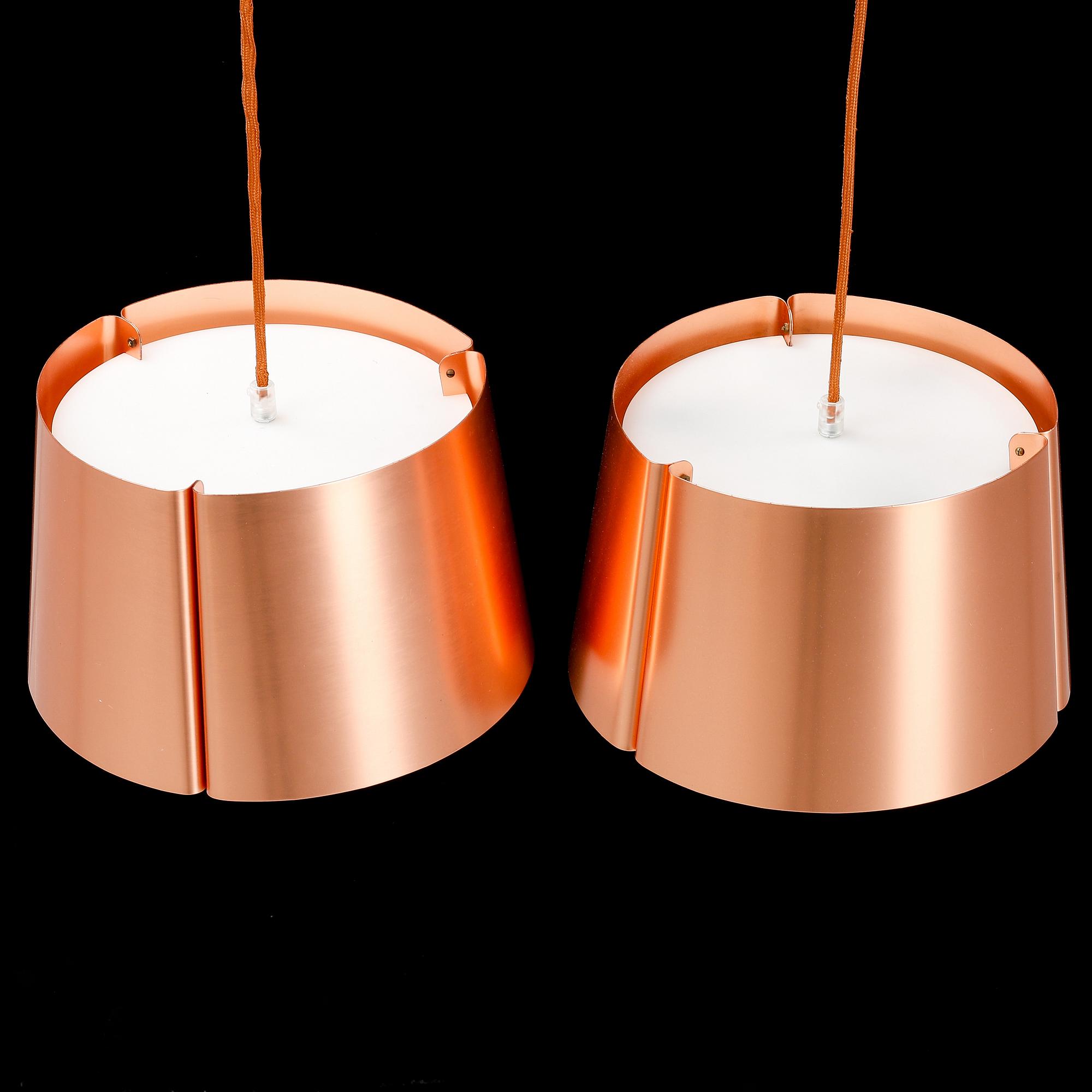Jonas Lindvall, two 
 "W124" pendant lamps.