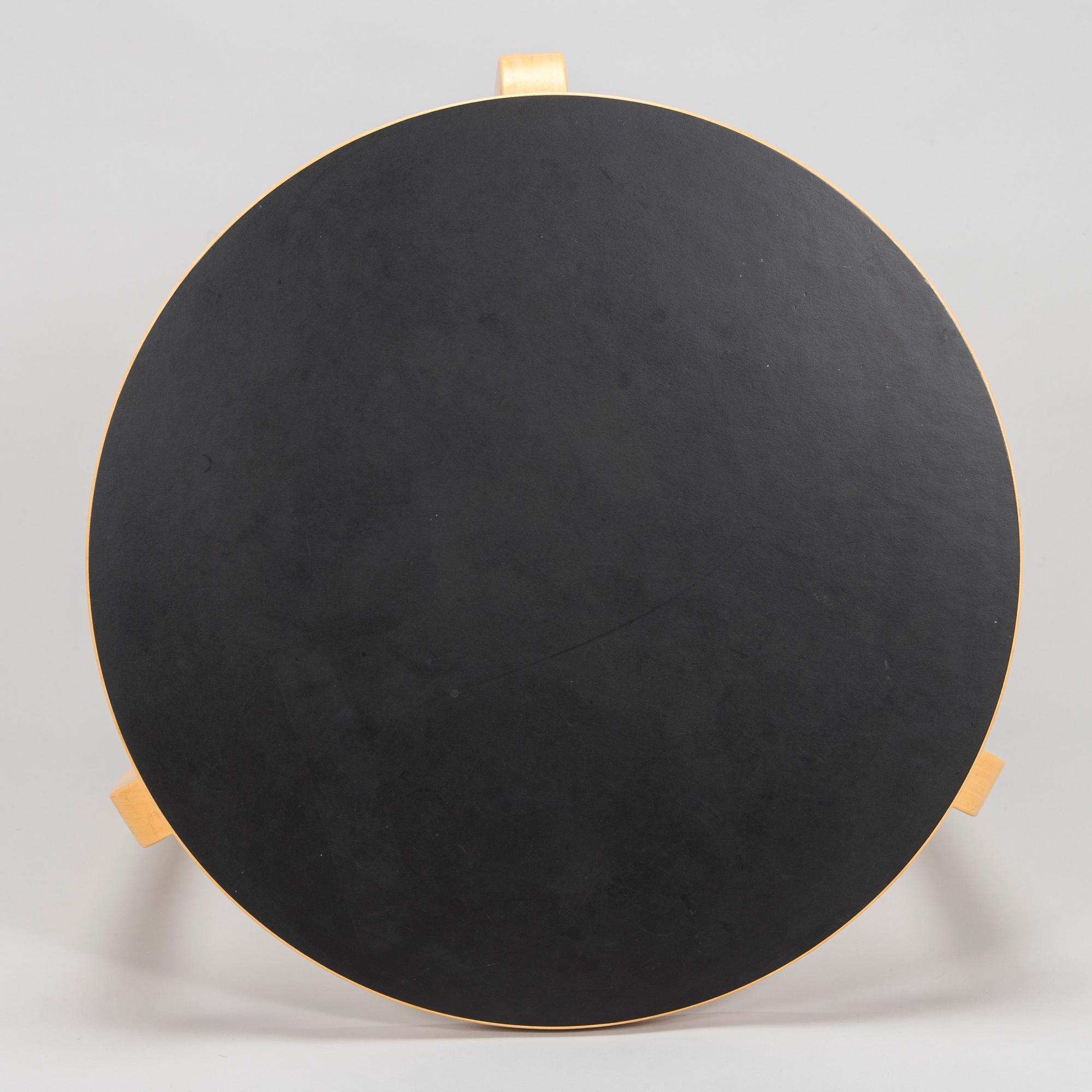 Alvar Aalto, a table and three chairs, Artek 2006 and 2007.