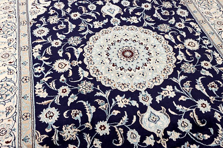 A part silk Nain rug, 9LA, c. 292 x 190 cm.
