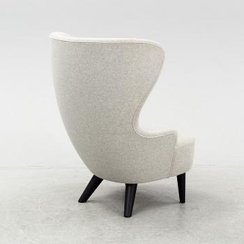 A 'Wingback Micro' easy chair by Tom Dixon.