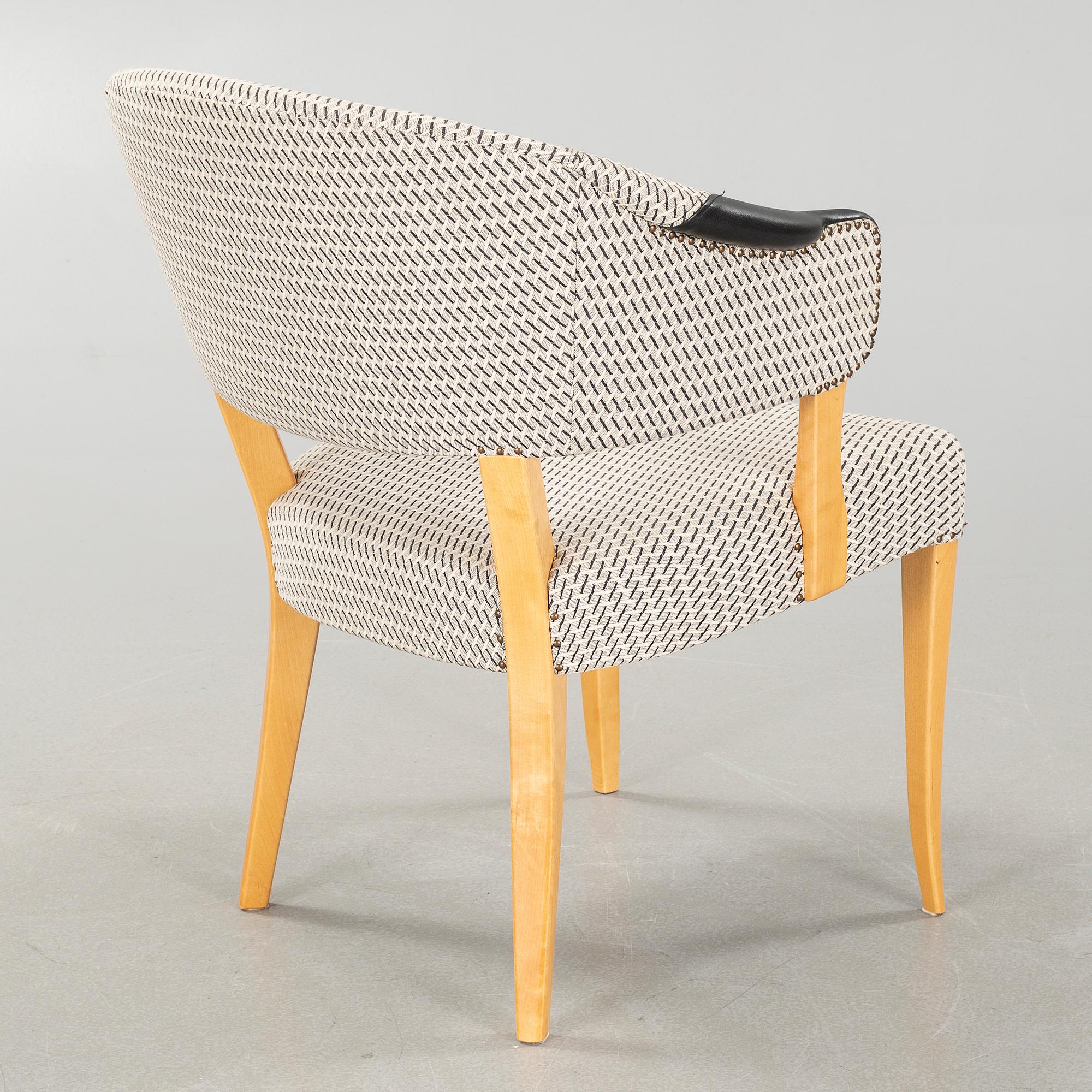 A 21st century"Lata greven" armchair by Carl Malmsten, O.H Sjögren.