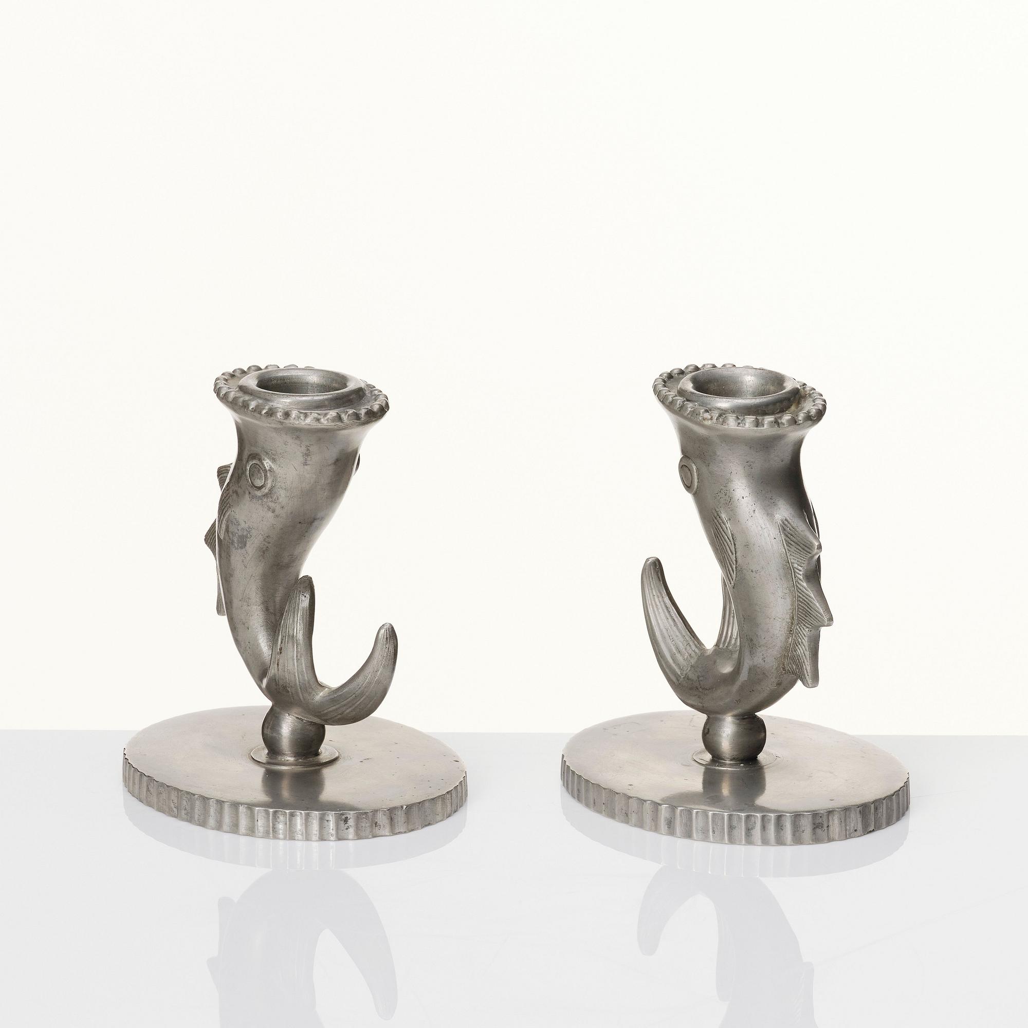Carl Milles, two pewter candlesticks, Herman Bergman AB, Stockholm 1927 and 1930.
