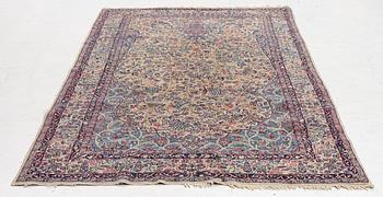 A semi antique Kirman rug, South Persia, c. 228 x 136 cm.