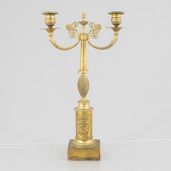 An Empire candelabra, first half of the 19th century.