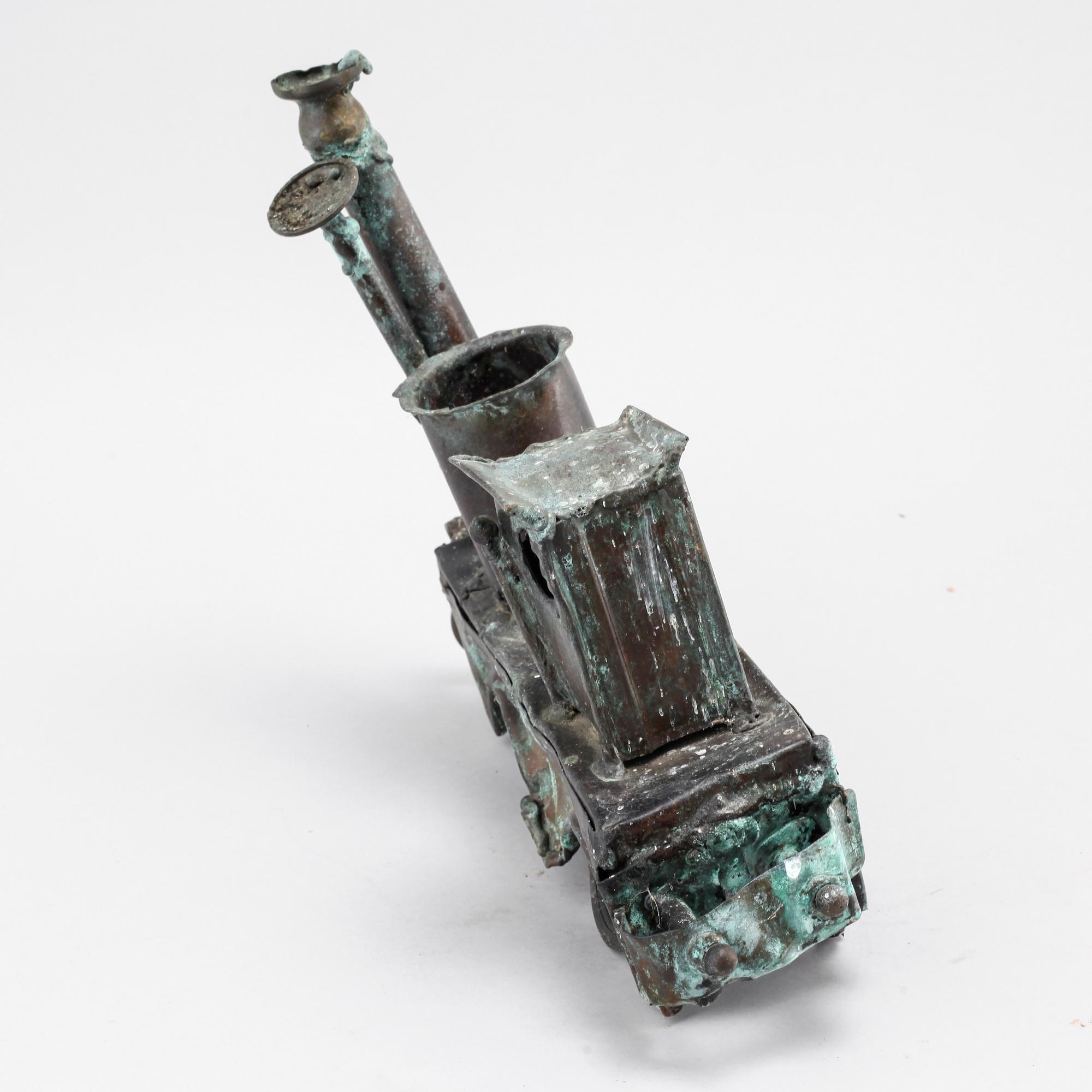 a metal sculpture, not signed.