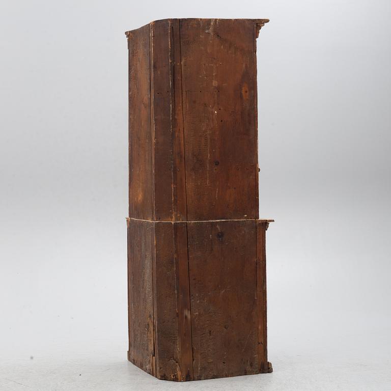 A Gustavian corner cabinet, circa 1800.