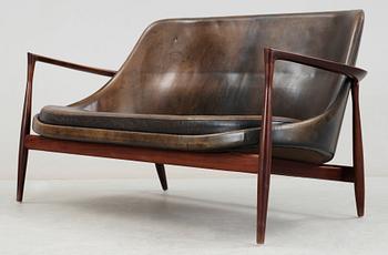 An Ib Kofod Larsen 'Elisabeth' palisander and black leather sofa, Christensen & Larsen, Denmark 1950-60's.