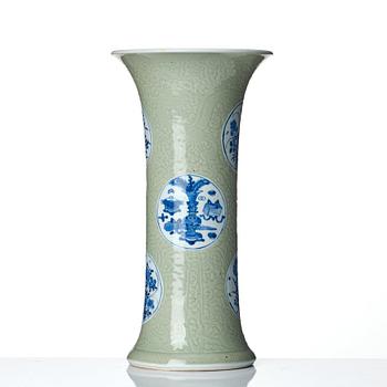 A Chinese blue and white celadon-ground beaker vase, Qing dynasty, Kangxi (1662-1722).