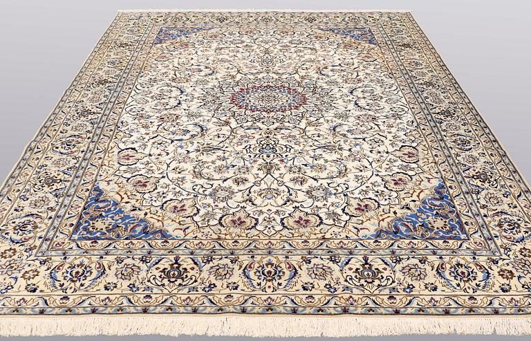 A carpet, Nain part silk, 364 x 256 cm.