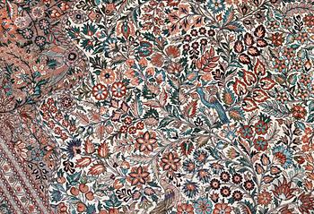 An oriental pictoral silk rug, approx. 280 x 183 cm.
