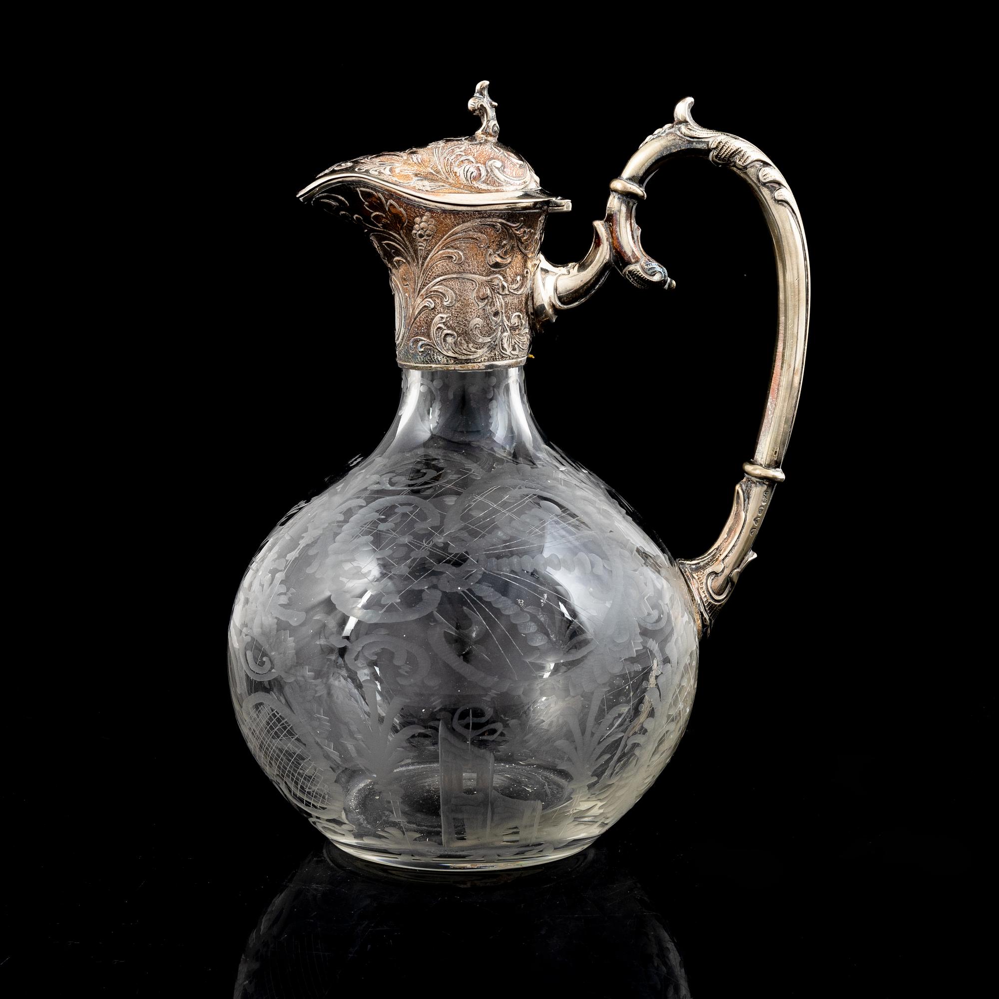 A wine decater, glass and silver, Germany, early 20th century.