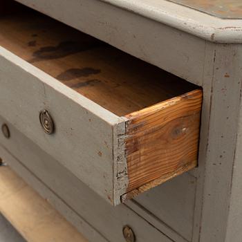 A first half of the 19th century painted chest of drawers.