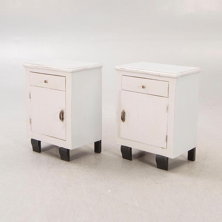 A pair of painted bedside table  first half of the 20th century.