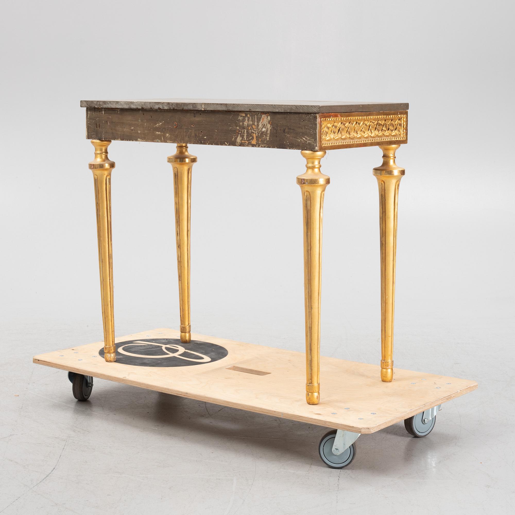 A console table with stone top.