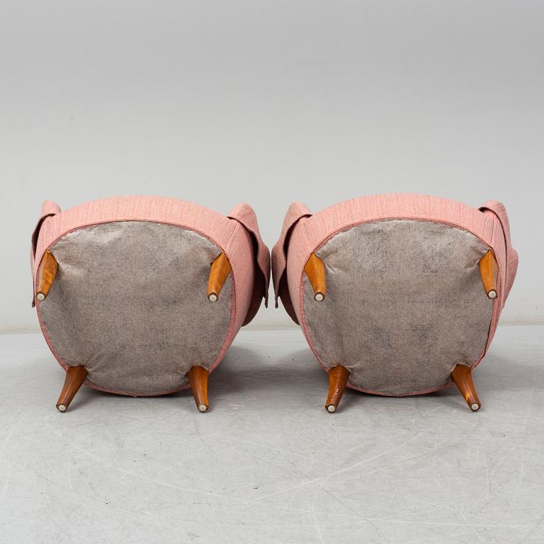 A pair of second half of the 20th Century 'Cirkus' easy chairs by Carl Malmsten.