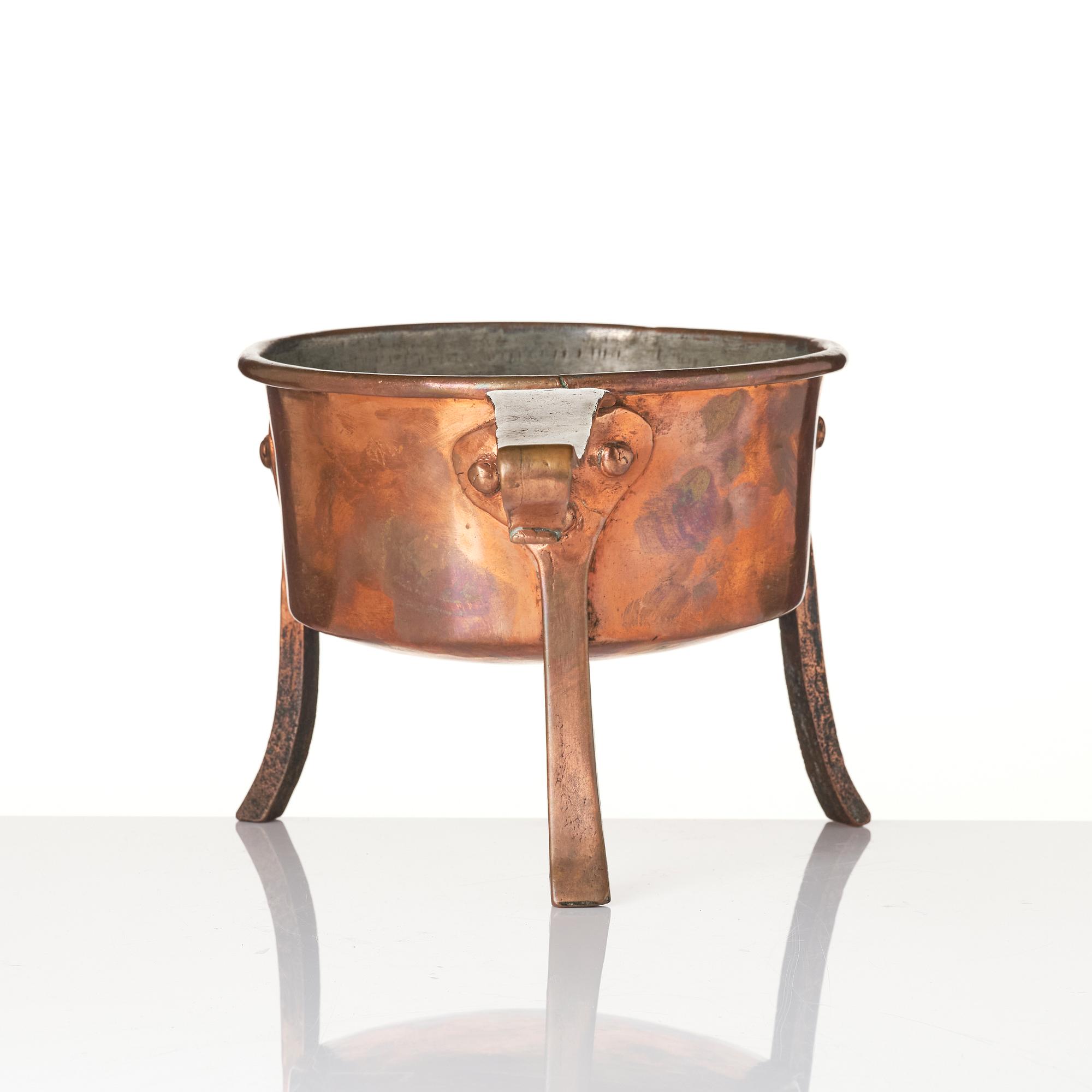 A copper saucepan, 18th century.
