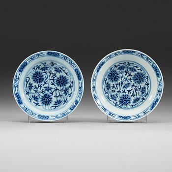 123. A pair of blue and white lotus dishes, Qing dynasty, Guangxu mark and period (1874-1908).