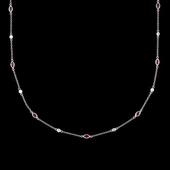 A ruby and diamond necklace.