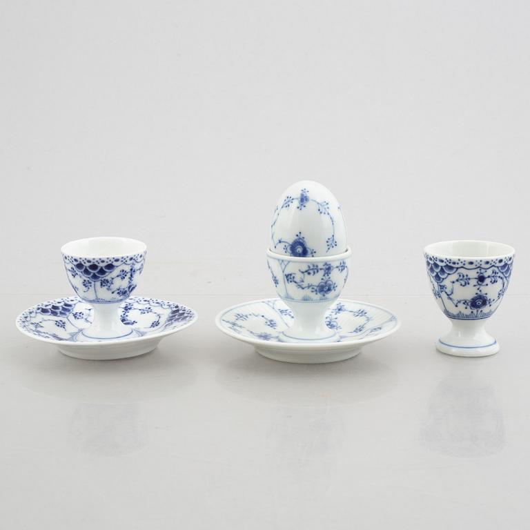 A group of three egg cups, a pair of salt/pepper shakers and two sauce boats, "Blue Fluted"/"Musselmalet", Royal Copenha.